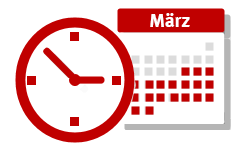 Uhr mit Kalenderblatt im Hintergrund