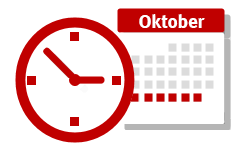 Uhr mit Kalenderblatt im Hintergrund